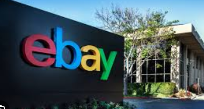 Founder Shoaib Younas working on an eBay store from a home desk setup